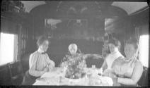 Eastman's travel companions in railroad car, California Trip