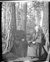 Adelaide Hubbell and Maria Eastman in forest, Oak Lodge Trip