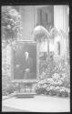 Philip Alexius de László's portrait of George Eastman displayed in conservatory