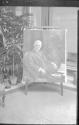 Charles Hopkinson's portrait of George Eastman displayed in conservatory