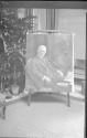 Charles Hopkinson's portrait of George Eastman displayed in conservatory