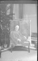 Charles Hopkinson's portrait of George Eastman displayed in conservatory