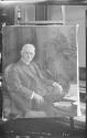 Charles Hopkinson's portrait of George Eastman displayed in conservatory