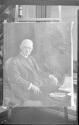 Charles Hopkinson's portrait of George Eastman displayed in conservatory