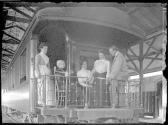 George Eastman's travel companions on train balconey, Mexican Trip