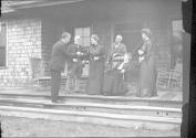 George Eastman and guests on porch, Oak Lodge Trip