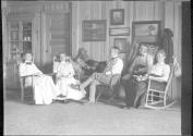 George Eastman and guests inside Lodge, Oak Lodge Trip