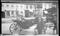 [Women in horse drawn carriage]