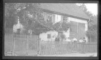 [Group outside house]