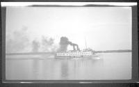 [Passenger boat on river (?)]