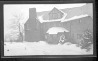 [Front of snow covered house]