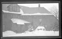 [Front of snow covered house]