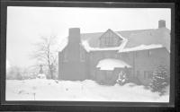 [Front of snow covered house]