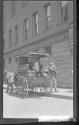 [Men with horse drawn wagon]