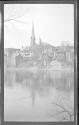 [View of town along river]