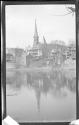 [View of town along river]