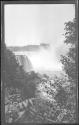 [Falls seen through trees]