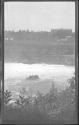 [Passenger boat in river gorge]