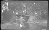 [Bridge over stream]