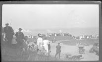 [Group of people overlooking lake]