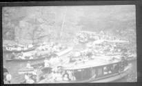 [Large group of boats on river]