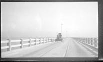 [Automobile on causeway]