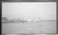 [Harbor view, Brooklyn Bridge in distance]