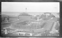 [Formal garden overlooking lake]