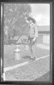 [Man with pail & milkcan]