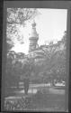 [Park view, large hotel building in distance]