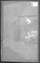 [Zoller (?) with man in native costume]