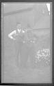 [Zoller (?) with man in native costume]