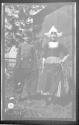 [Girl & boy in native costume]