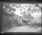 [Group of children on footbridge]