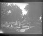 [View of formal garden with fountain]