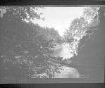 [Landscape with boats on river]