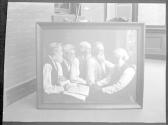 [Copy of large framed group portrait]