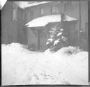 [Front of snow covered house]