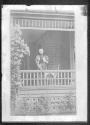 Maria Eastman on porch-not 900 East Ave.