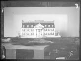 Model of George Eastman House on pedestal