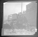 Men working at site of stage coach accident