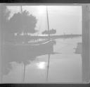 Boat moored at dock