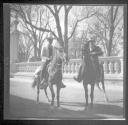 Two men on horses