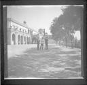 Three Men Standing on the Main Patio of Castillo de Chapultepec (Chapultepec Castle)