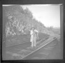 Boy on train tracks