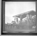 Men on mule drawn cart
