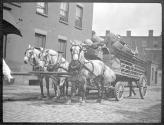 Horse drawn cart of kegs: Bartholemew Brewery Co.