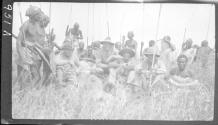 Group portrait of natives and hunters, African Safari