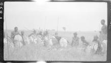 Natives posing with shields and spears, African Safari