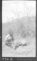 Native with dead gazelle, African Safari